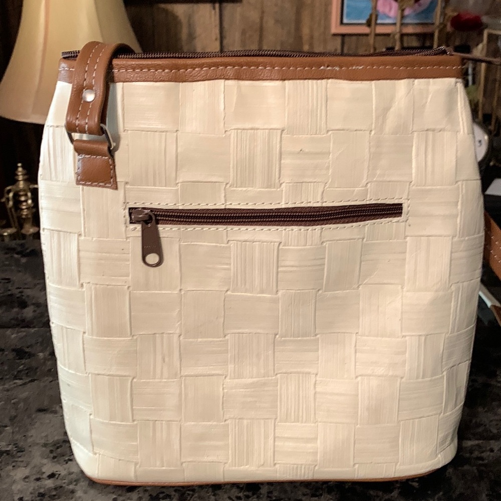 Gorgeous bags with designs  straps with unique strap positions, never used.